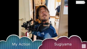 “My Action Sugiyama”というテロップが入って、My Actionのロゴの前にメガネをかけている僕