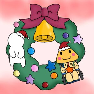 クリスマスリースにぶら下がっている、くらっかーくんとシロ子さん