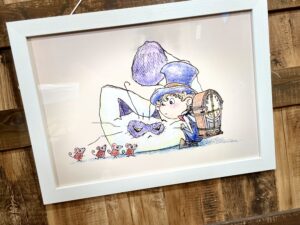 ルビッチとモフのイラストが額装されている写真